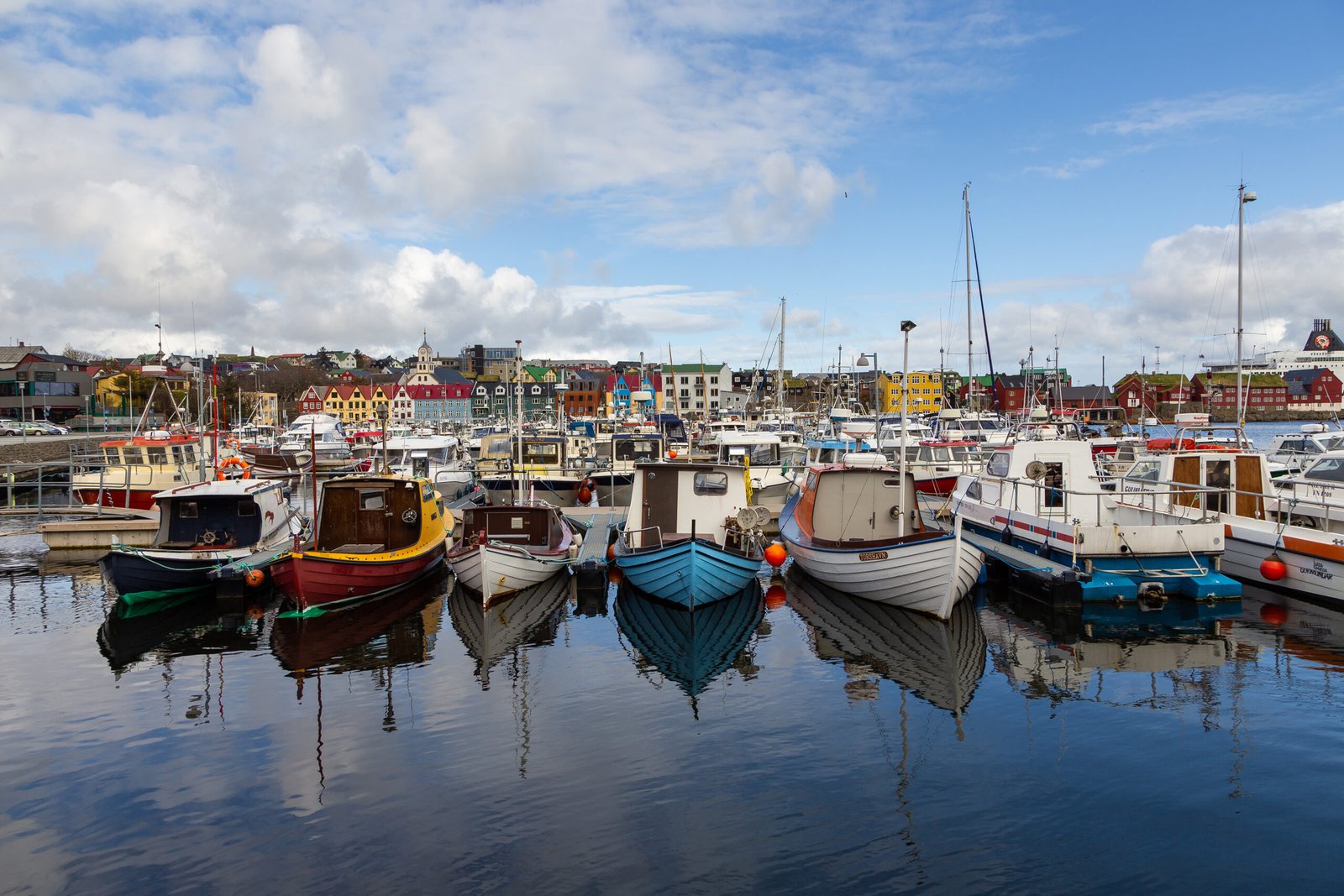 Thorshavn, Faroe Islands, Denmark - 03 May 2018: Thorshavn city, capital of The Faroe Islands. Port with moored yachts and boats.